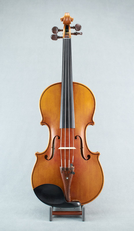 A beautiful, handmade Messiah Model Violin by Andrew Woods. 