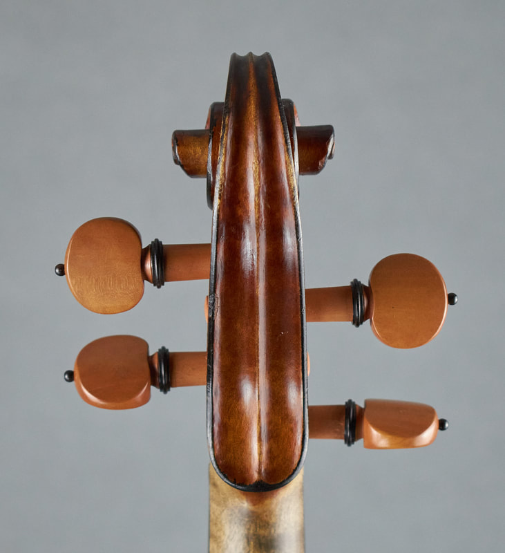 The scroll of a Mirecourt Violin with exceptional sound and playability (back view).